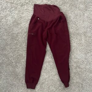 Maternity scrub pants. Brand is FIGS. Color is maroon. Small, petite.